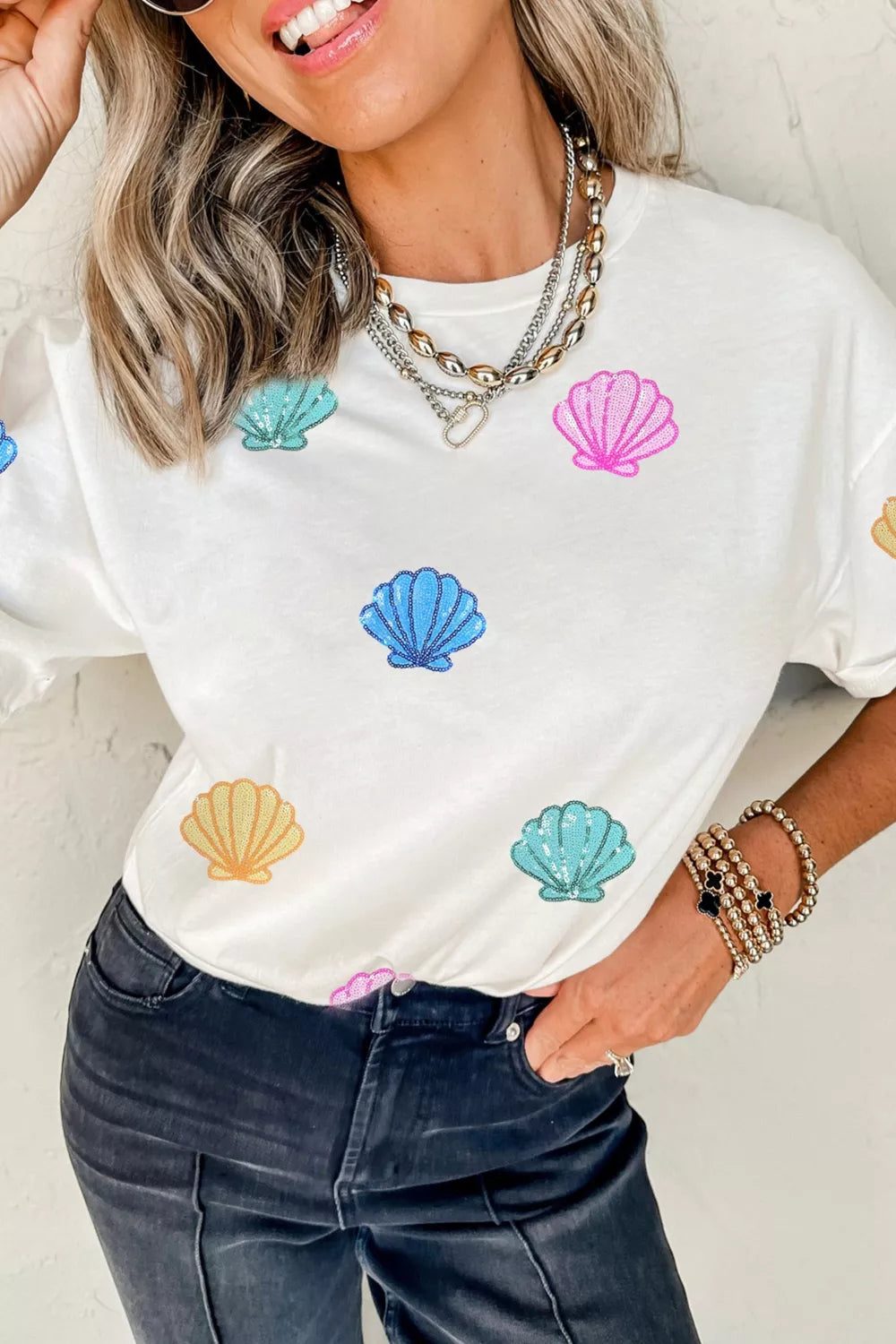 White sequin shell graphic short sleeve tee side view