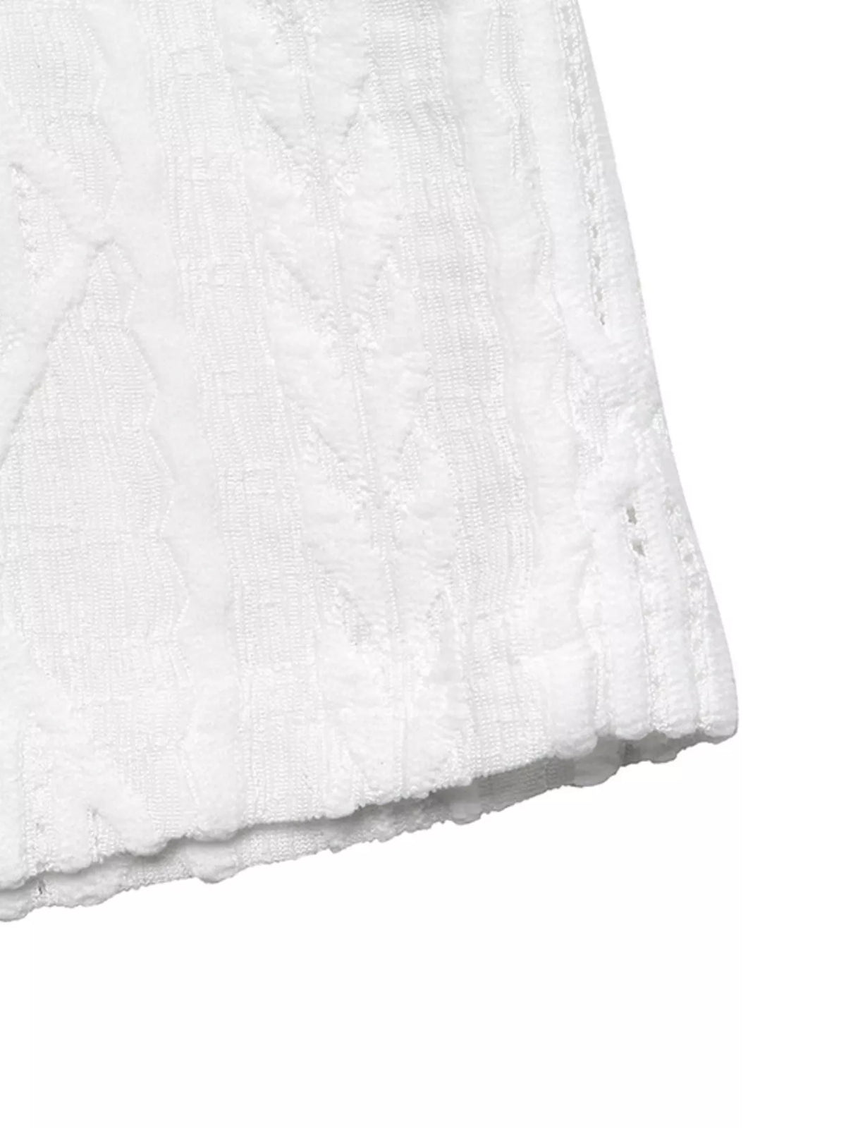 White textured knit tee fabric close up