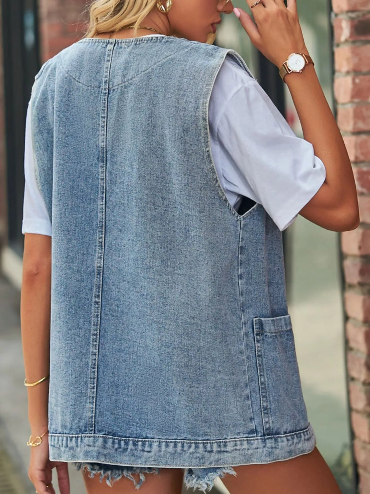 Sleeveless Button Down Denim Vest in Light Blue side view