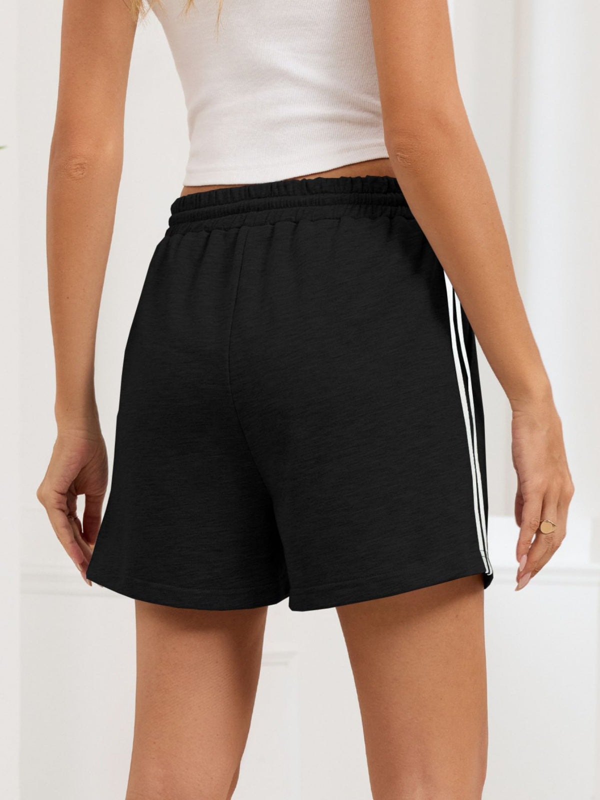 Full outfit view with the shorts and a fitted tank
