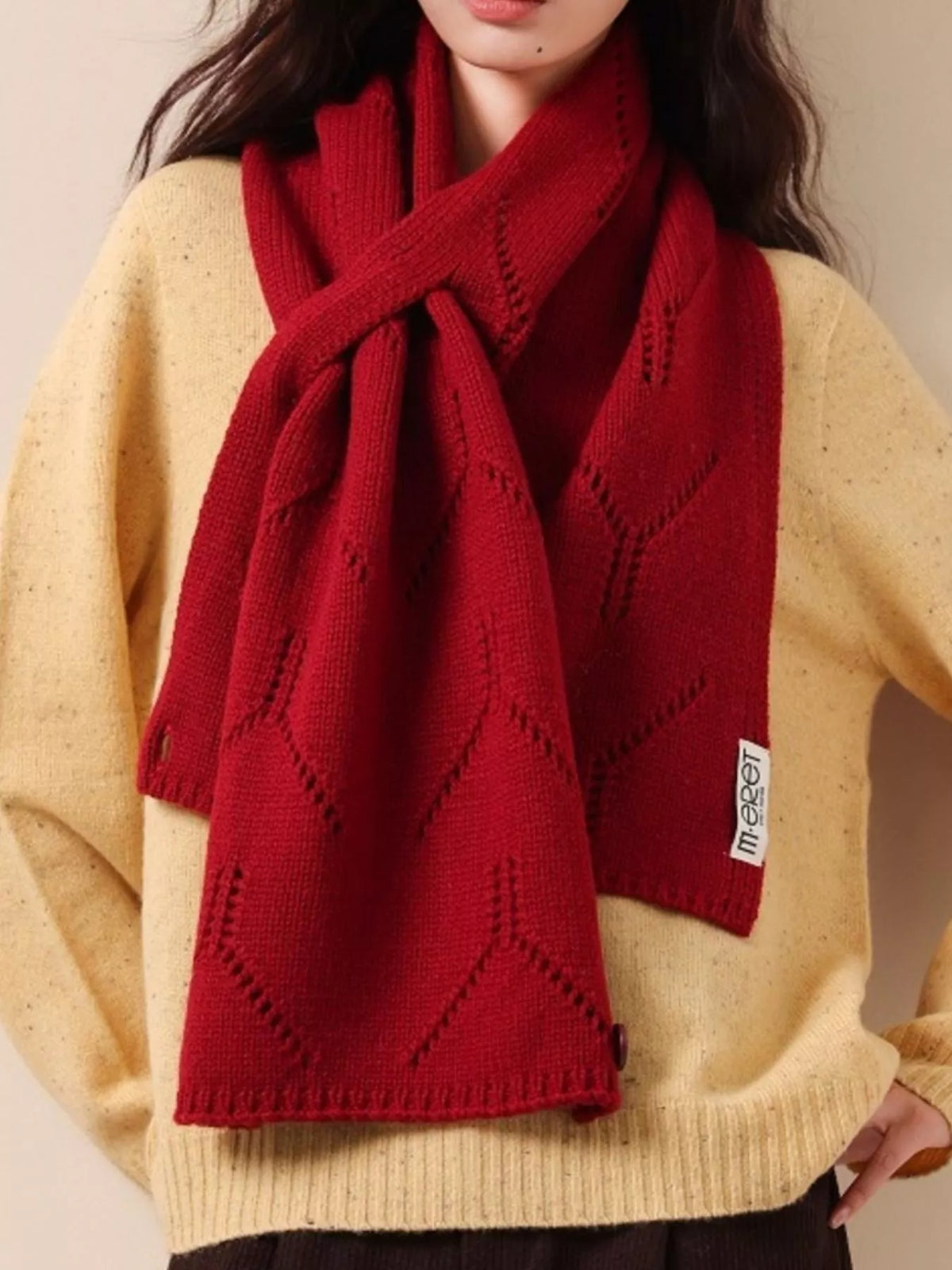Warm openwork wool scarf close up