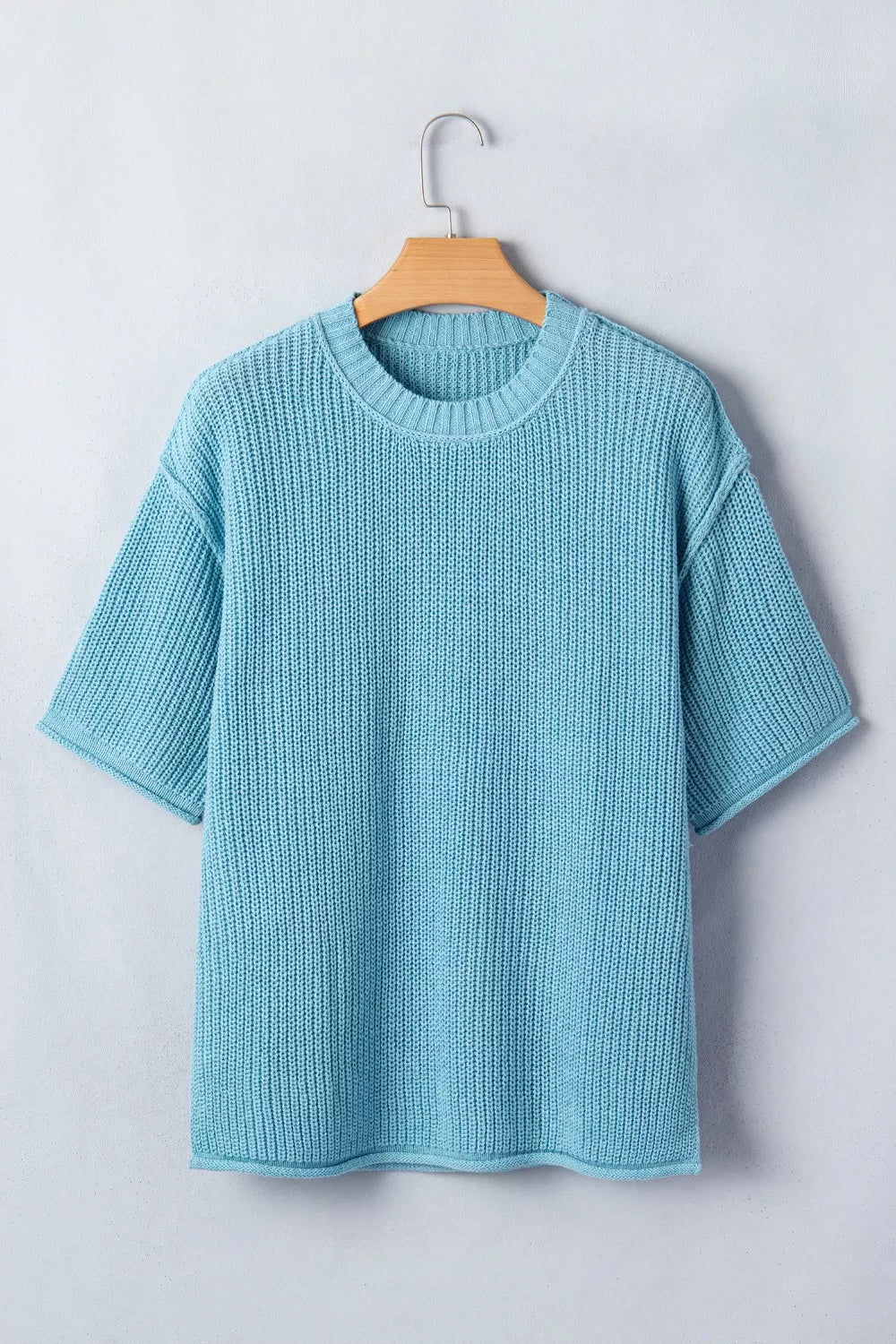 Half sleeve knit pullover sweater neckline close up