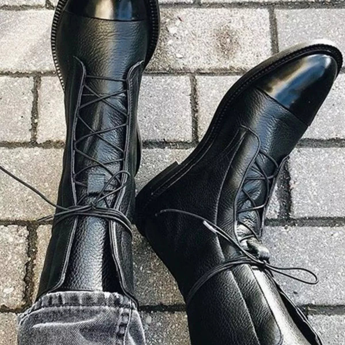 Black lace up leather boots back heel view