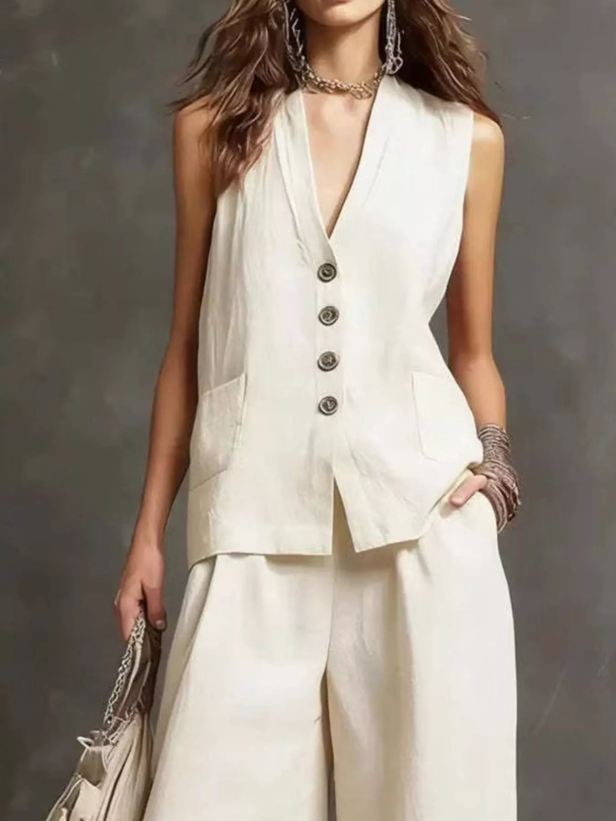 Matching vest and pants set styled with sandals