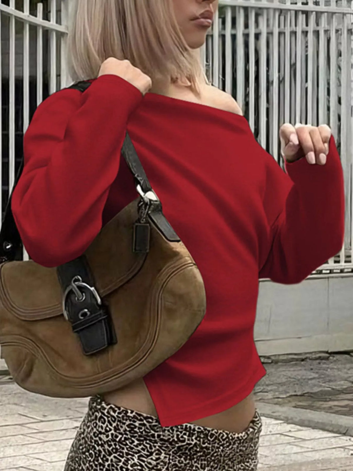Asymmetrical neckline shown from a raised angle