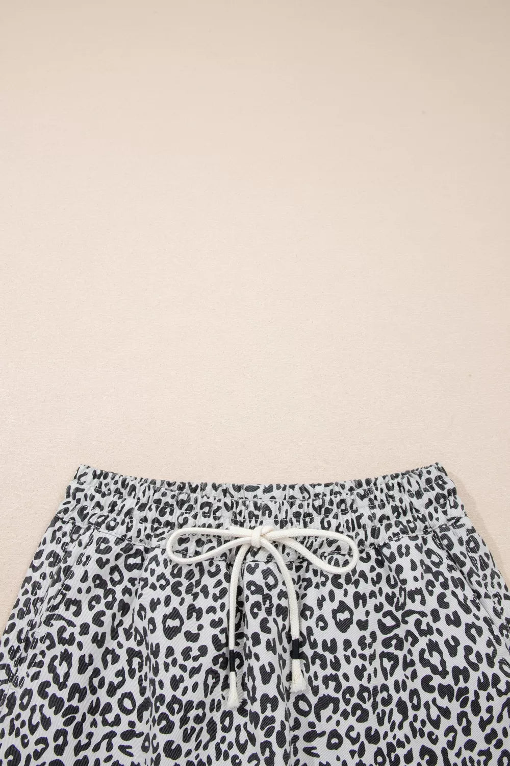 Leopard print denim skort front hem detail