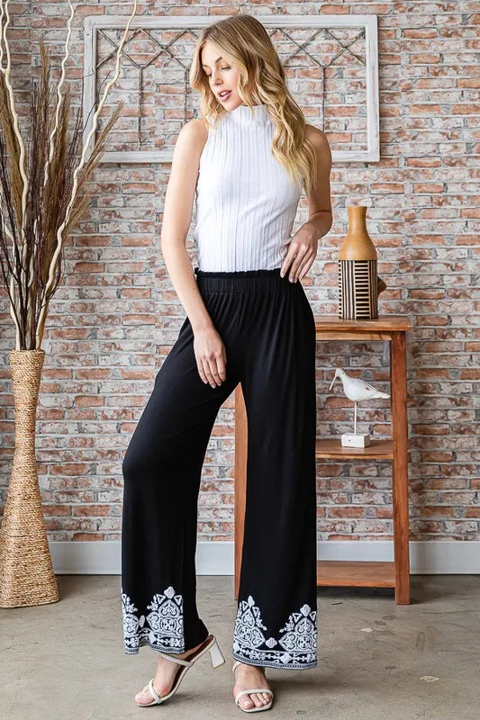 Casual black pants leg view