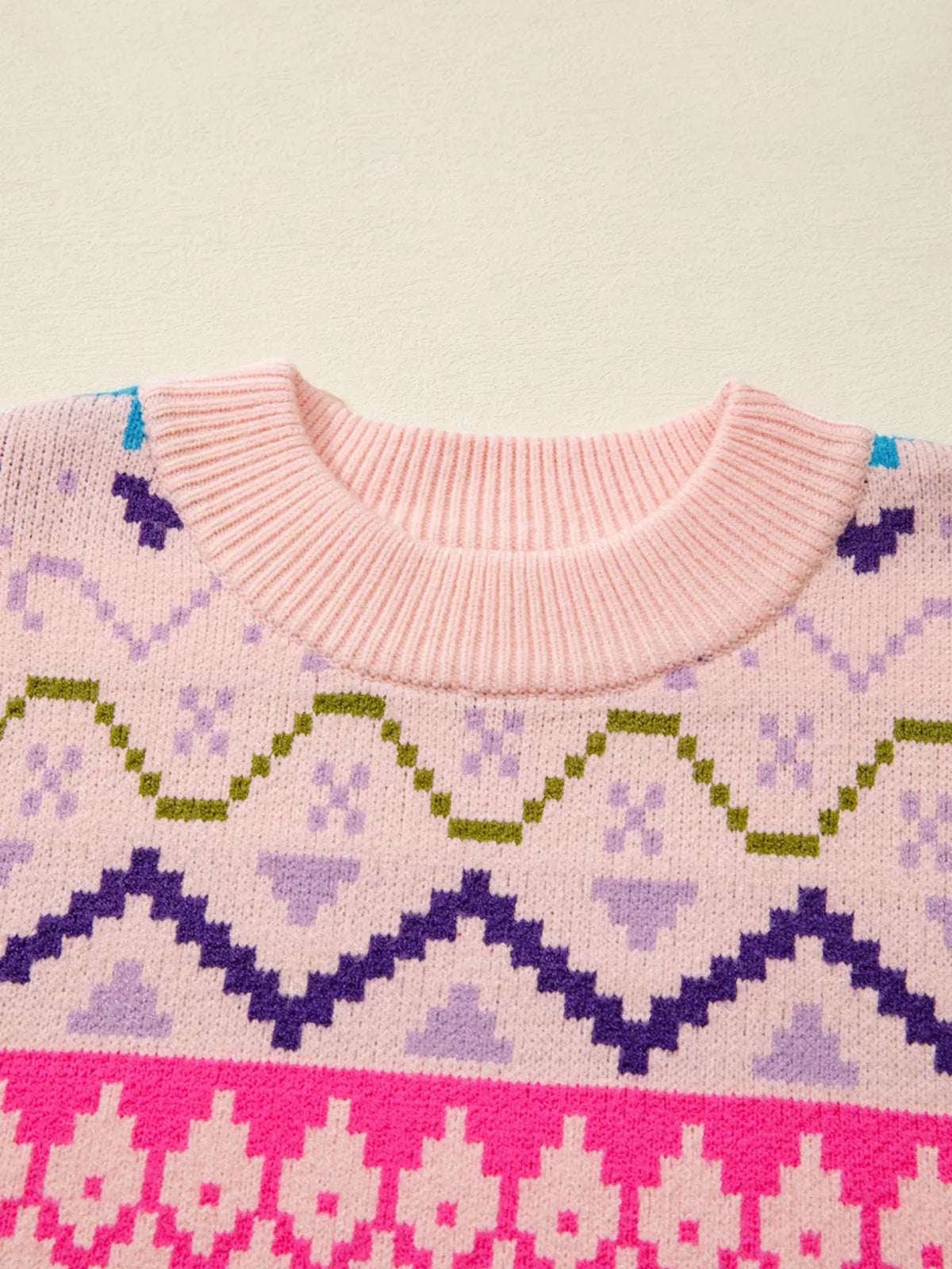 blush pink feather cuff patterned knit sweater sleeve and cuff detail