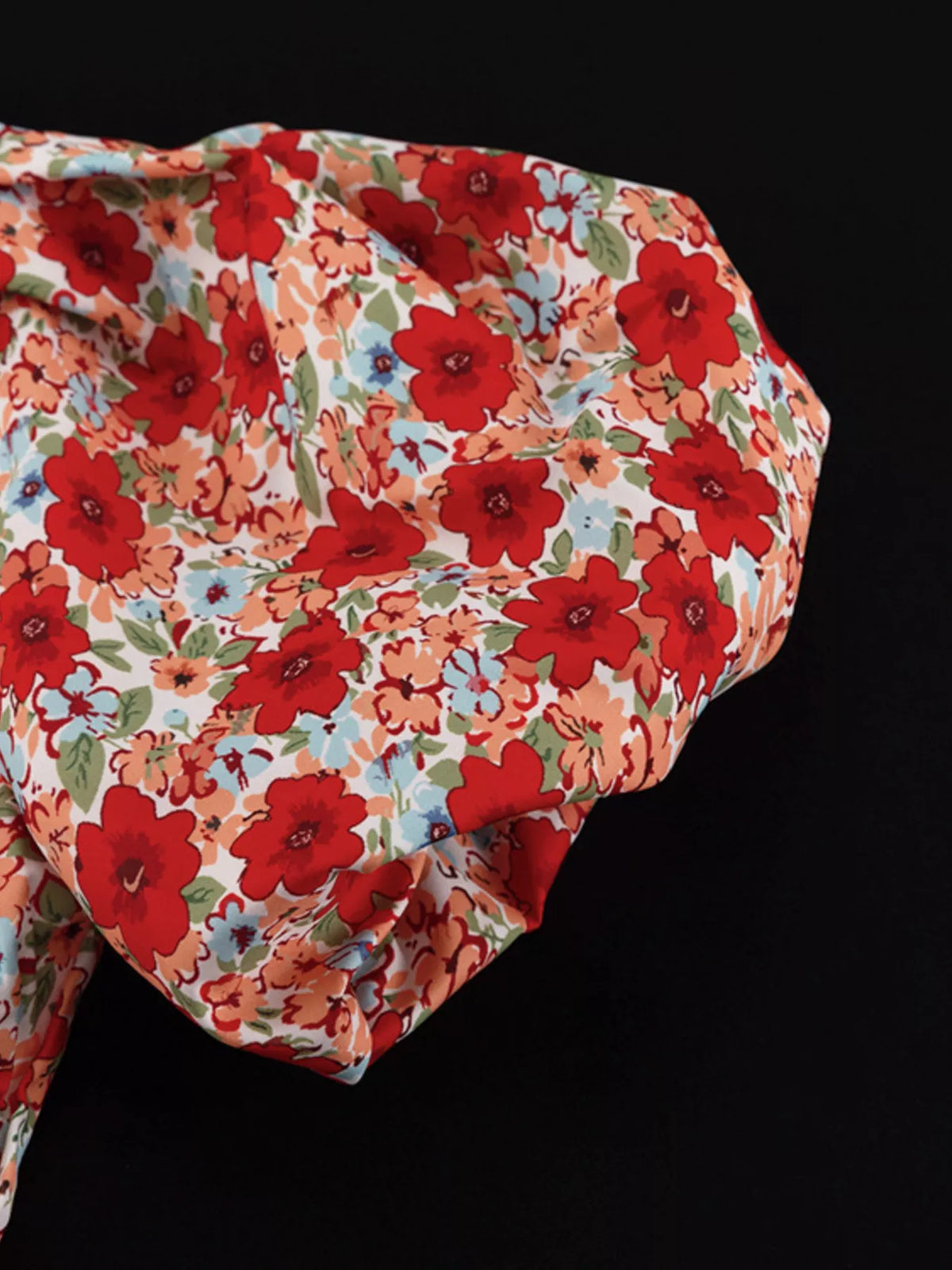 Ruched floral mini dress flat lay product view