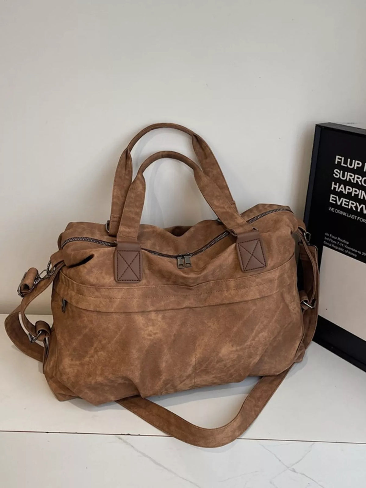 Brown vintage PU leather duffel bag front view