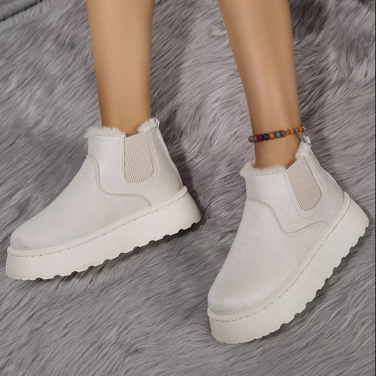 Round toe platform ankle boots three quarter view