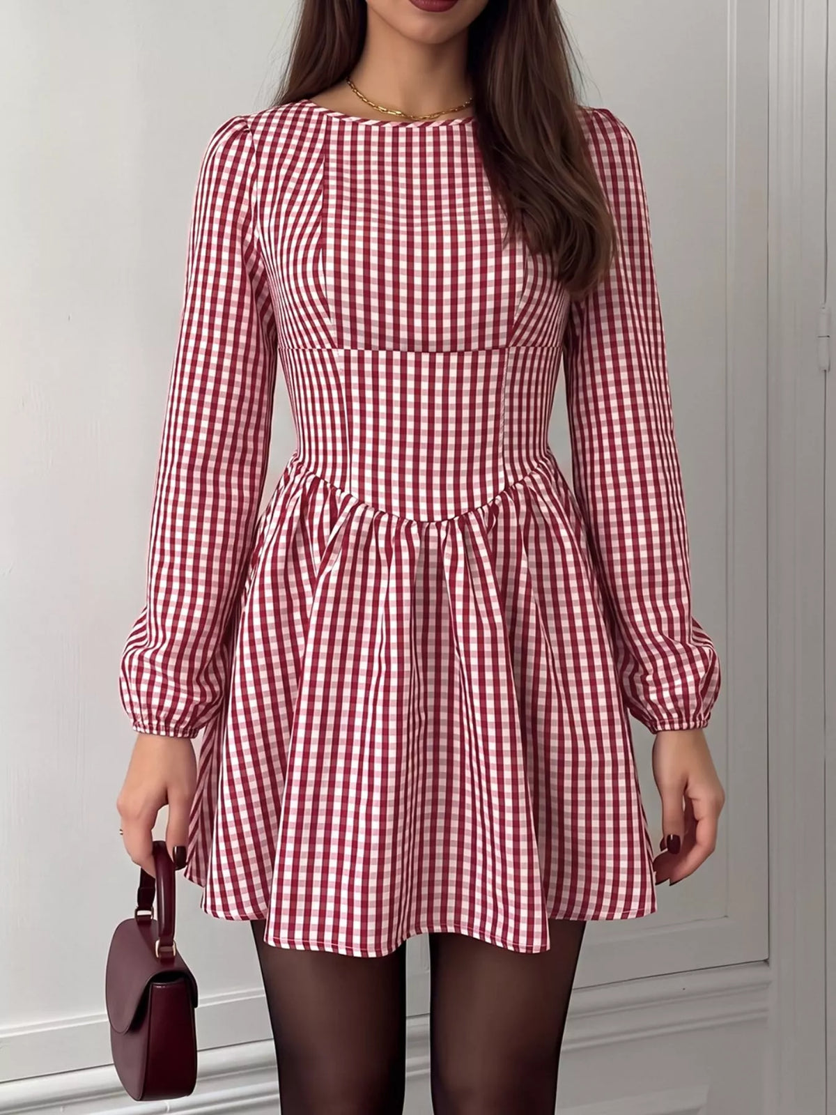 Long sleeve plaid dress styled with heels
