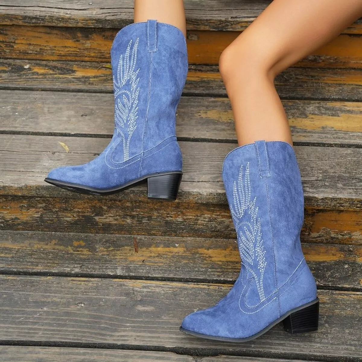 Point toe block heel boots, overhead view