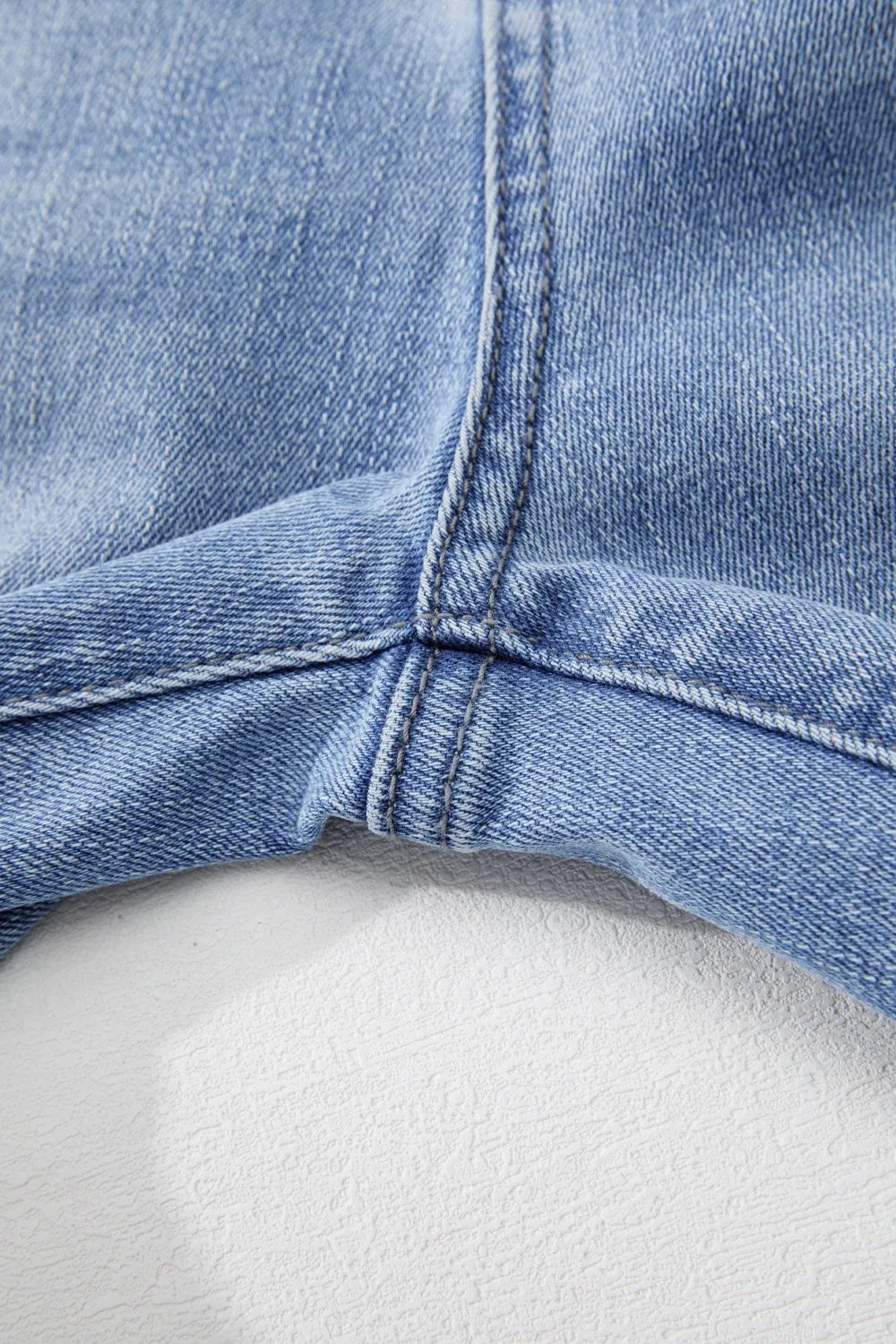 Side view of light blue flare jeans