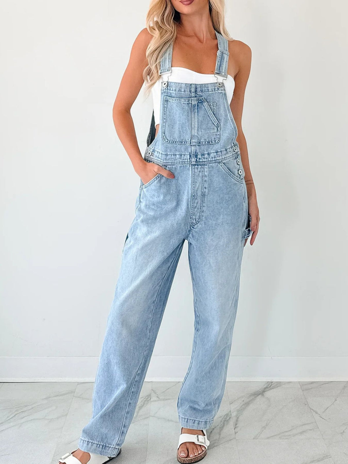 Relaxed denim overalls light blue wash detail