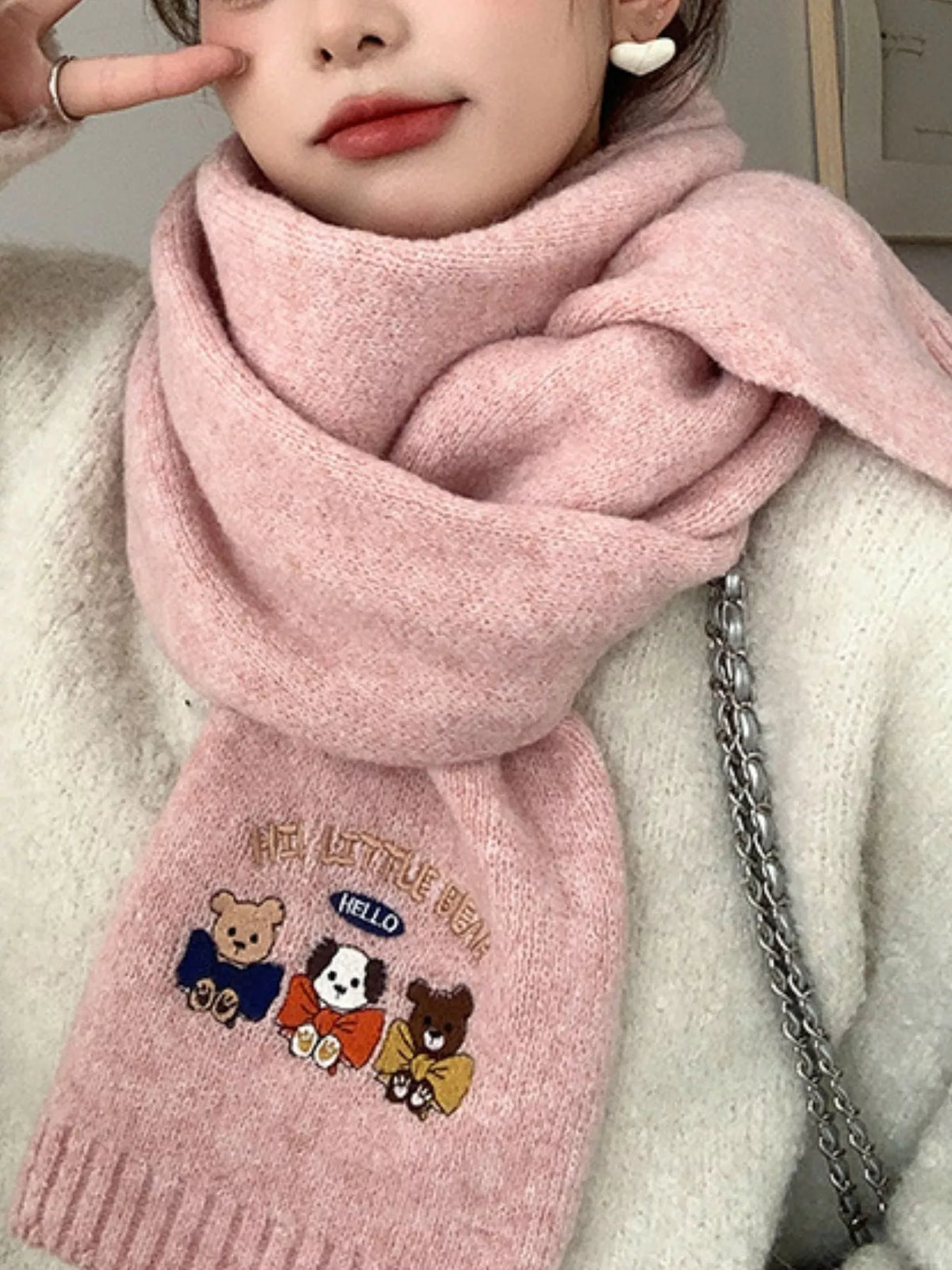 Embroidered scarf shown in a bright color option