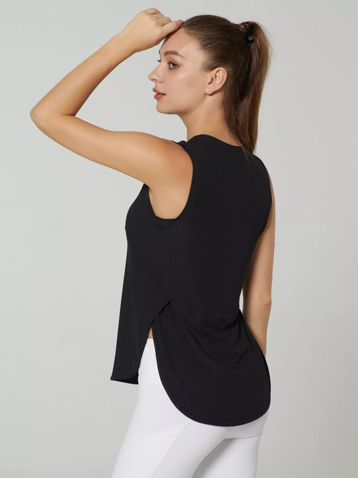 Ribbed active tank shown in a darker colorway