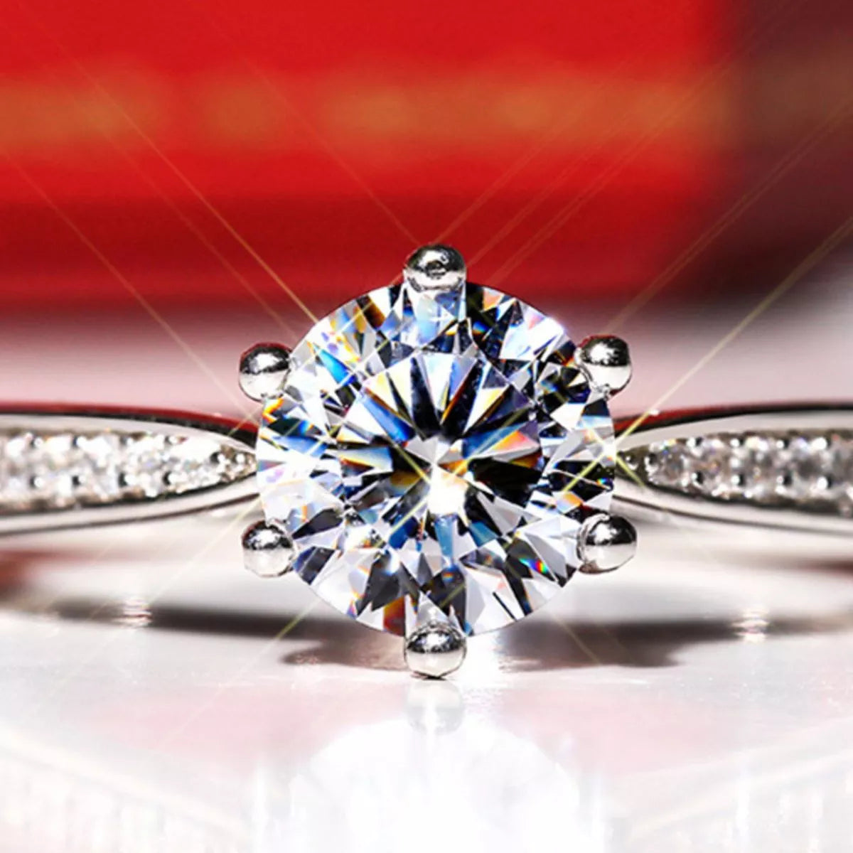 Moissanite ring shown with its matching box