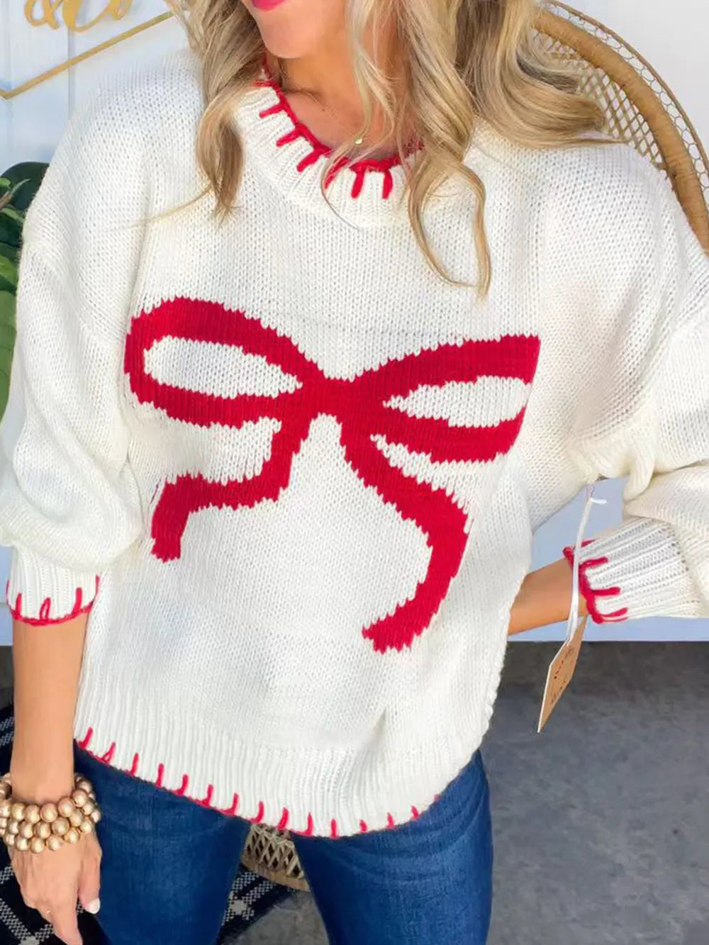 Bow knit sweater sleeve detail