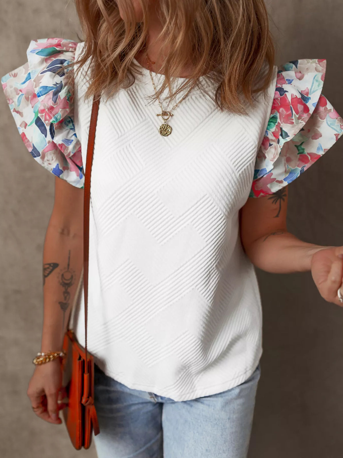 White abstract print tiered ruffle sleeve top styled outfit view