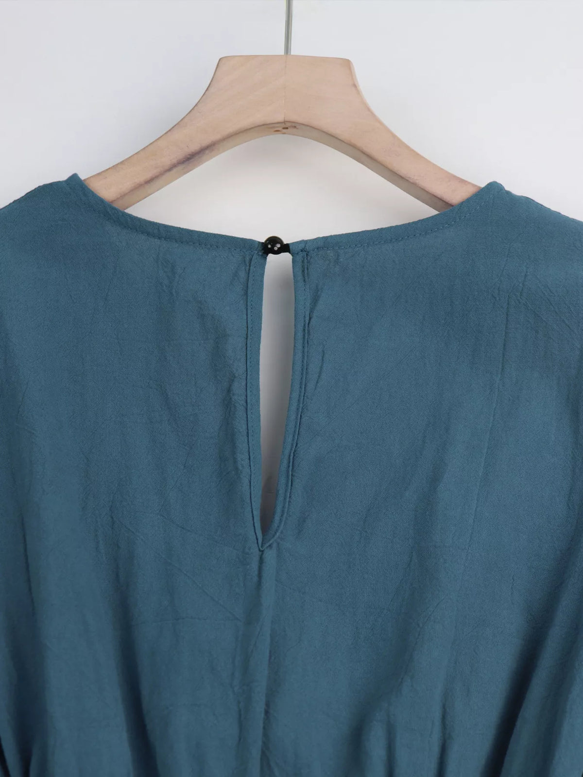 Tie waist flutter sleeve romper, side view