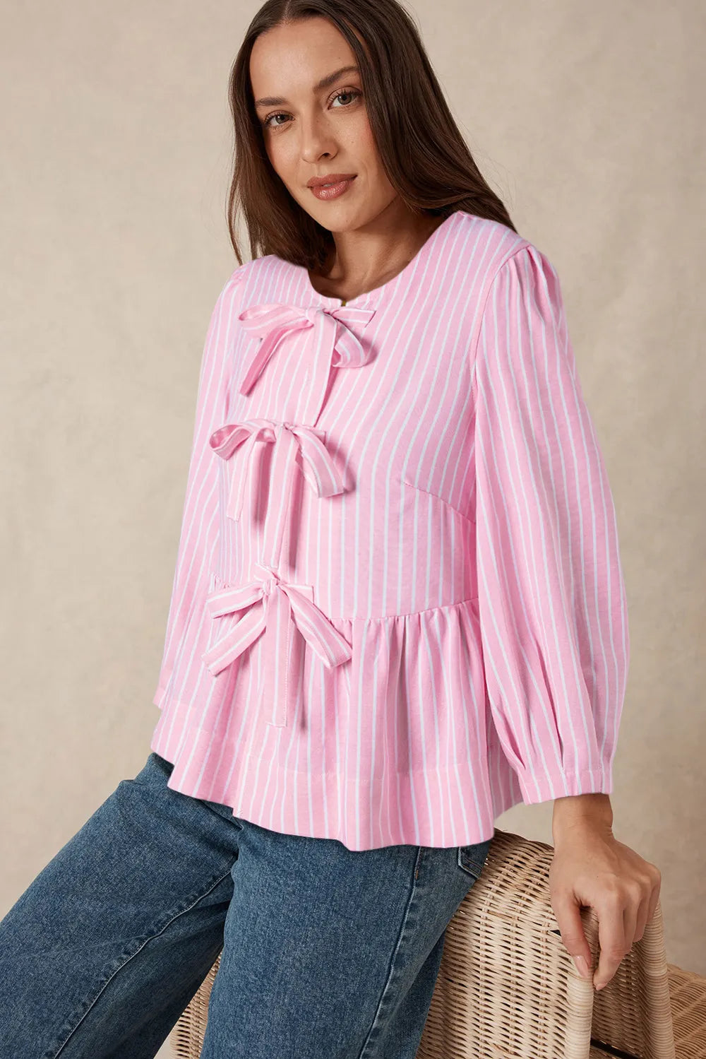 Striped blouse tie bow detail
