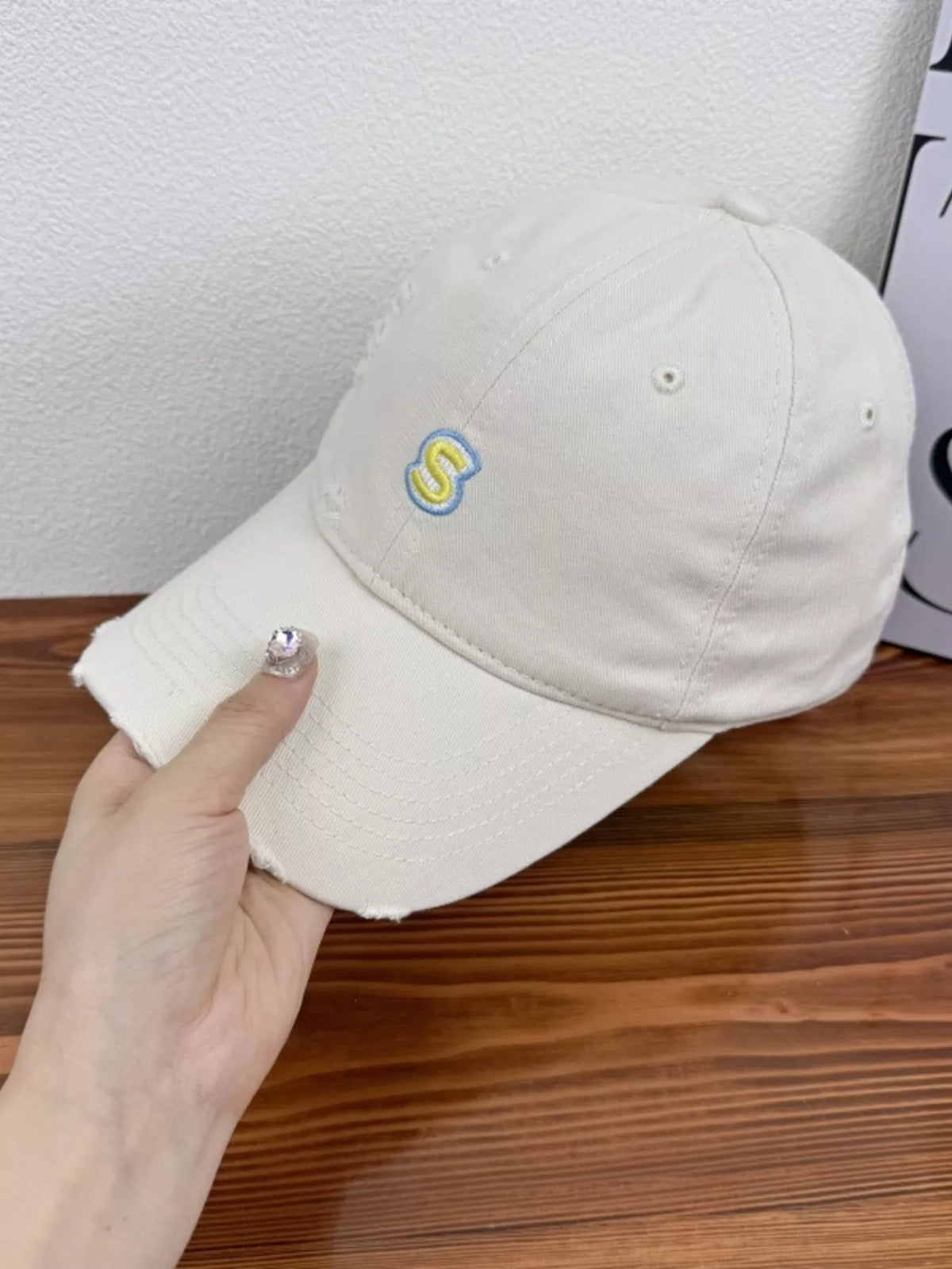 Detail of the distressed edges on the brim