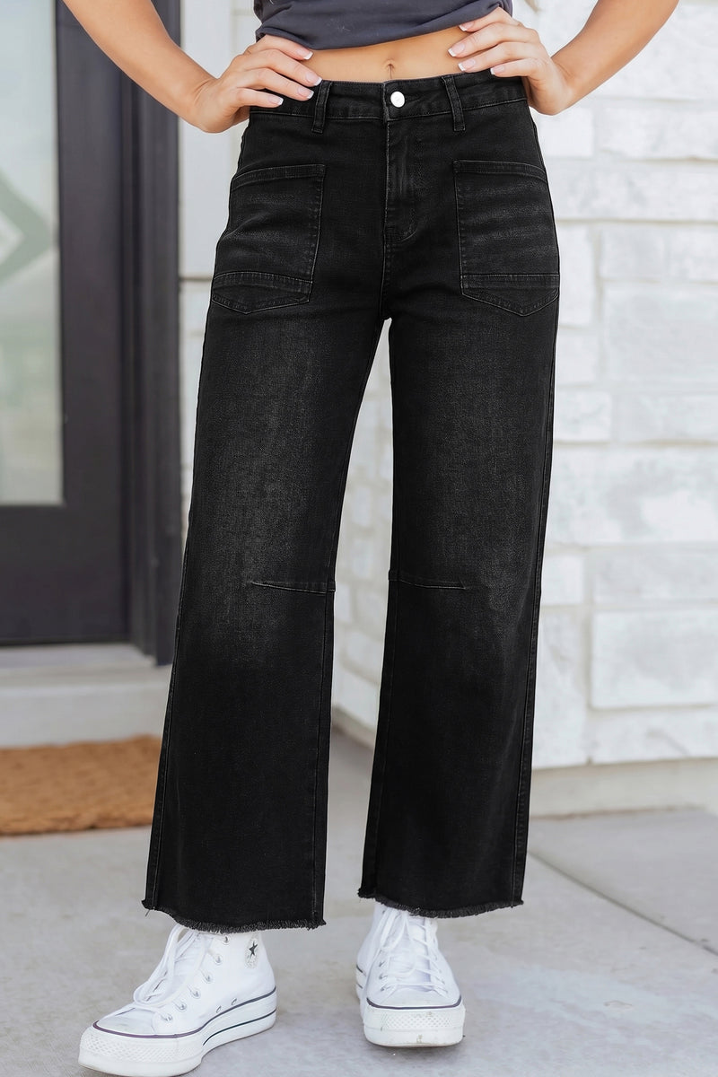 Black cropped barrel jeans with frayed hem front view