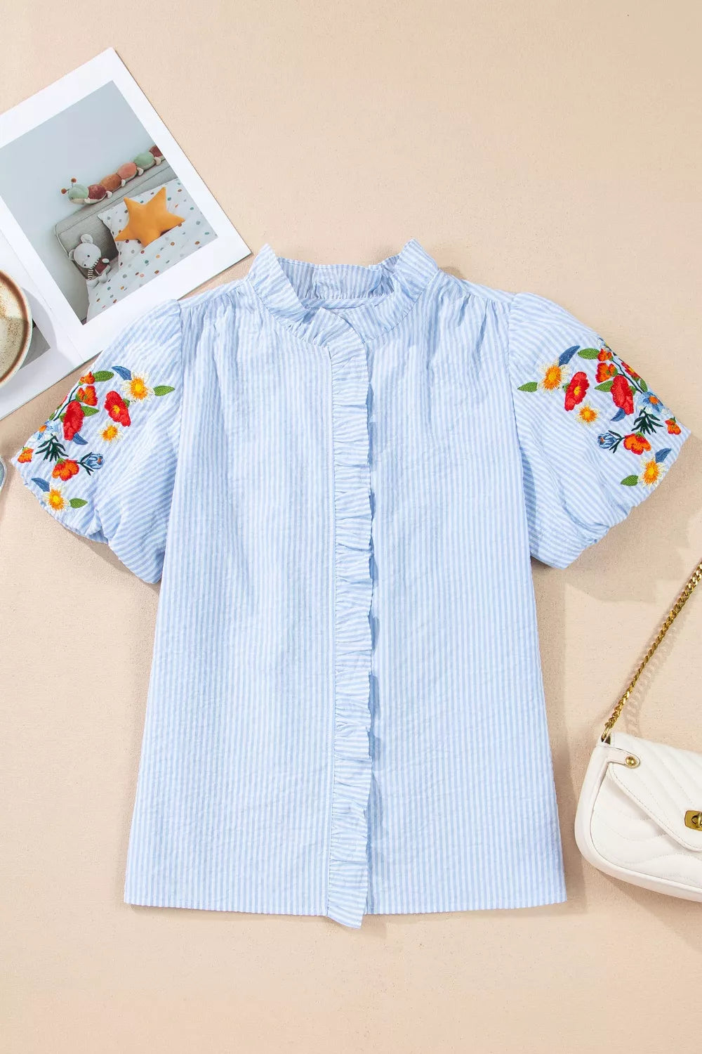Light blue striped floral embroidered puff sleeve shirt full length view