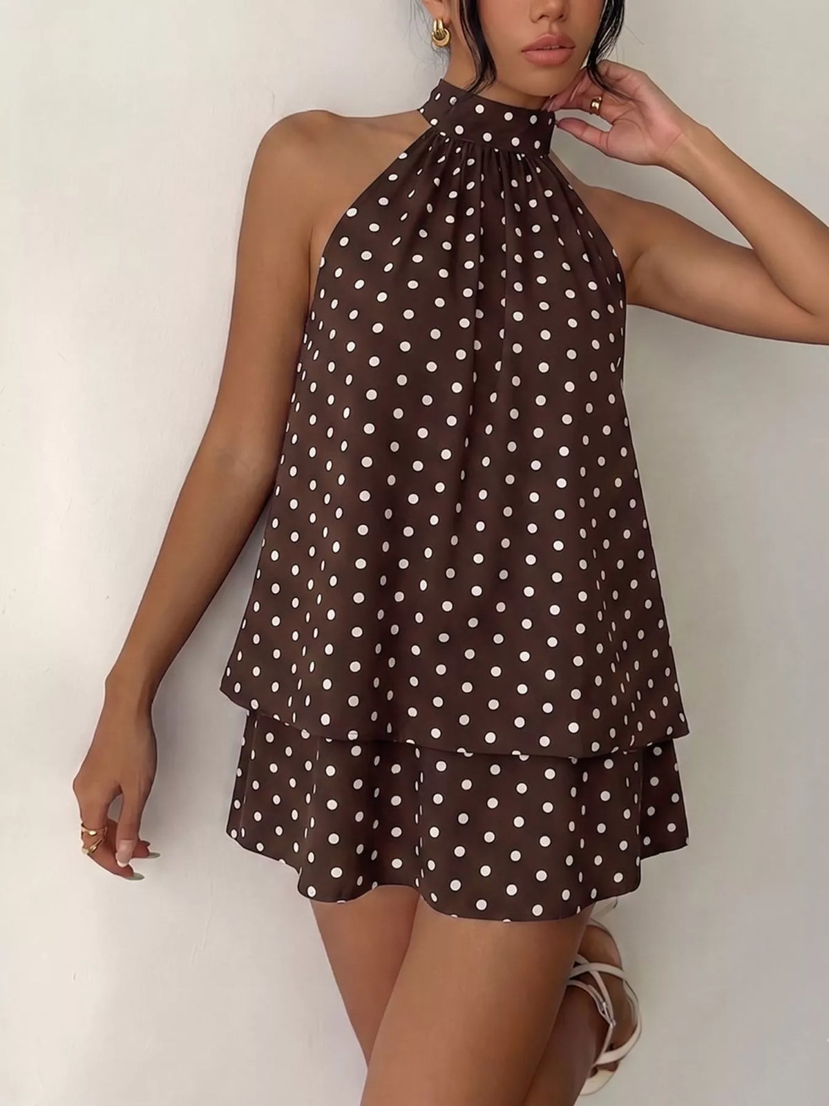 Apricot polka dot mini dress close up of print