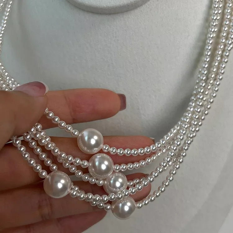 White pearl bead choker necklace, styled on model