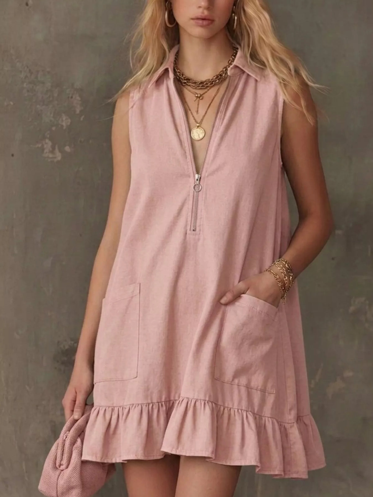 Sleeveless collared zip front dress back view