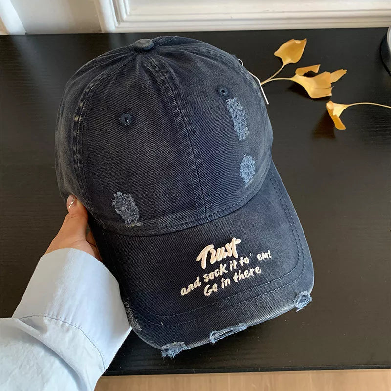 Side profile of distressed baseball cap