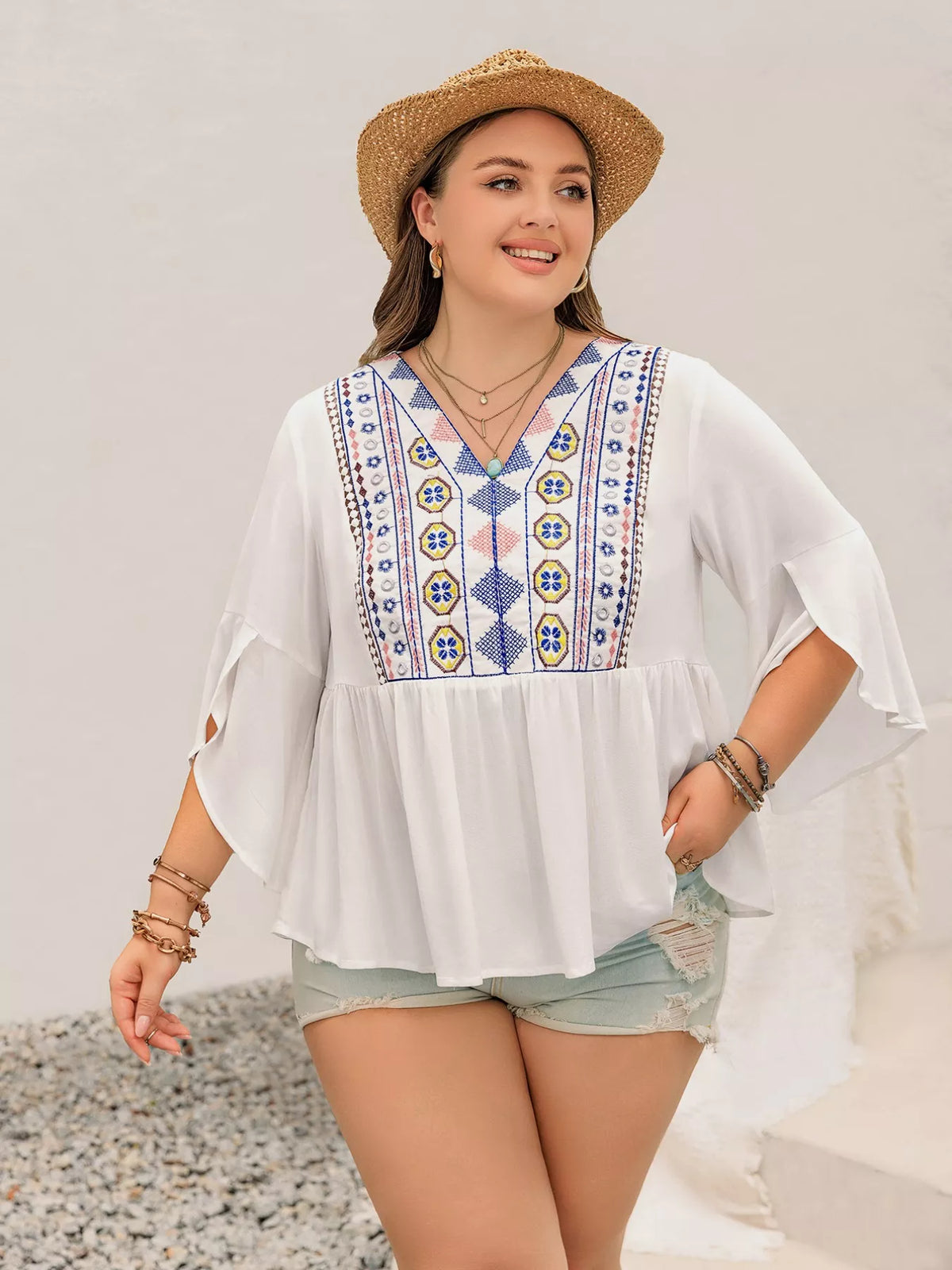 Geometric V neck flare sleeve blouse front view