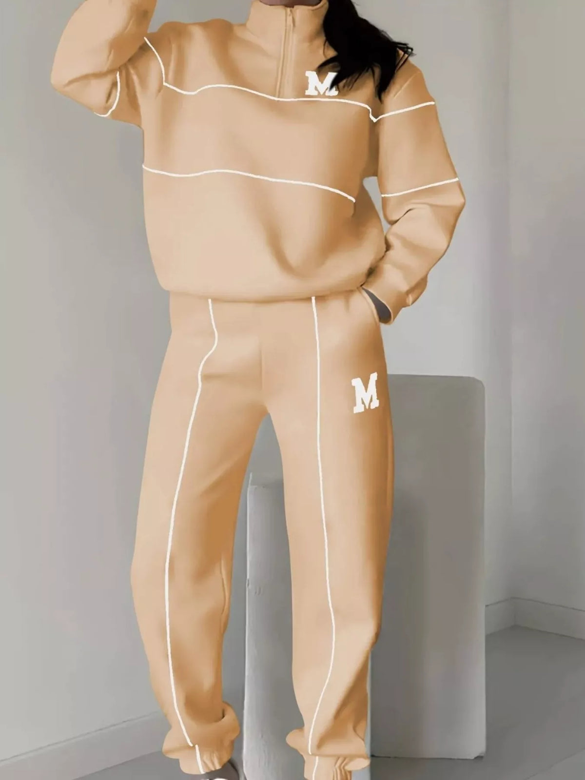 Quarter zip top and pants set fabric detail