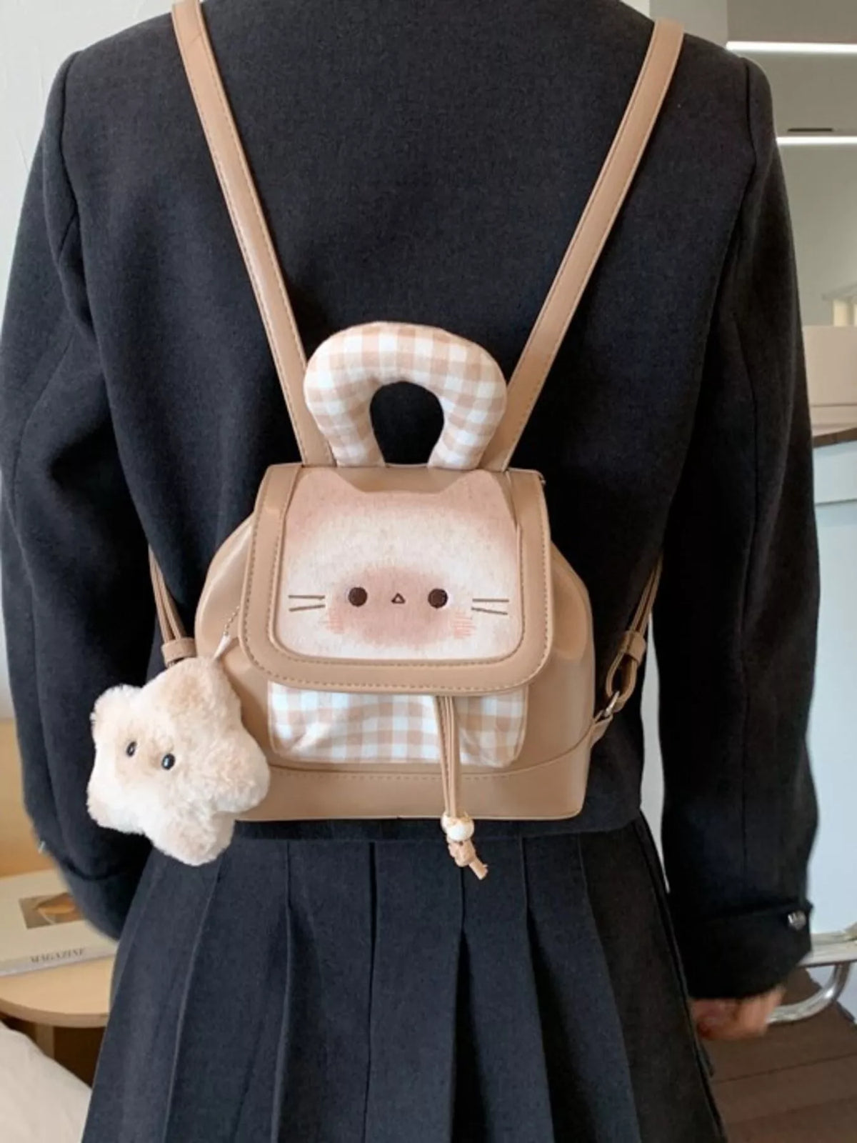 Cat plaid mini backpack worn by model