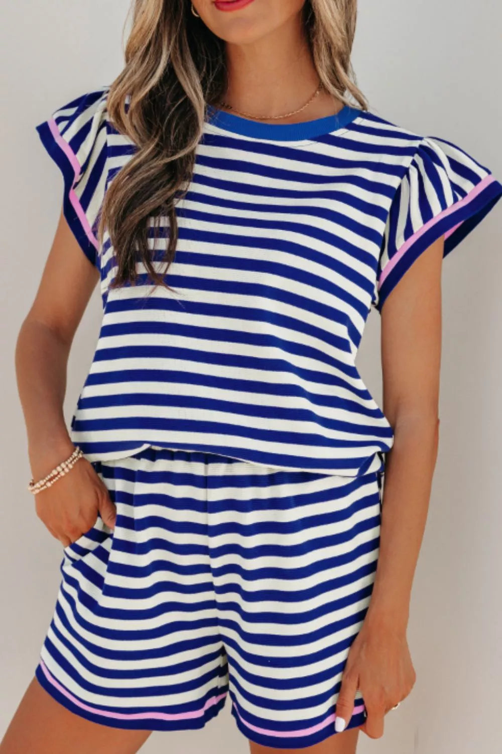 Coordinated royal blue striped top and shorts side view