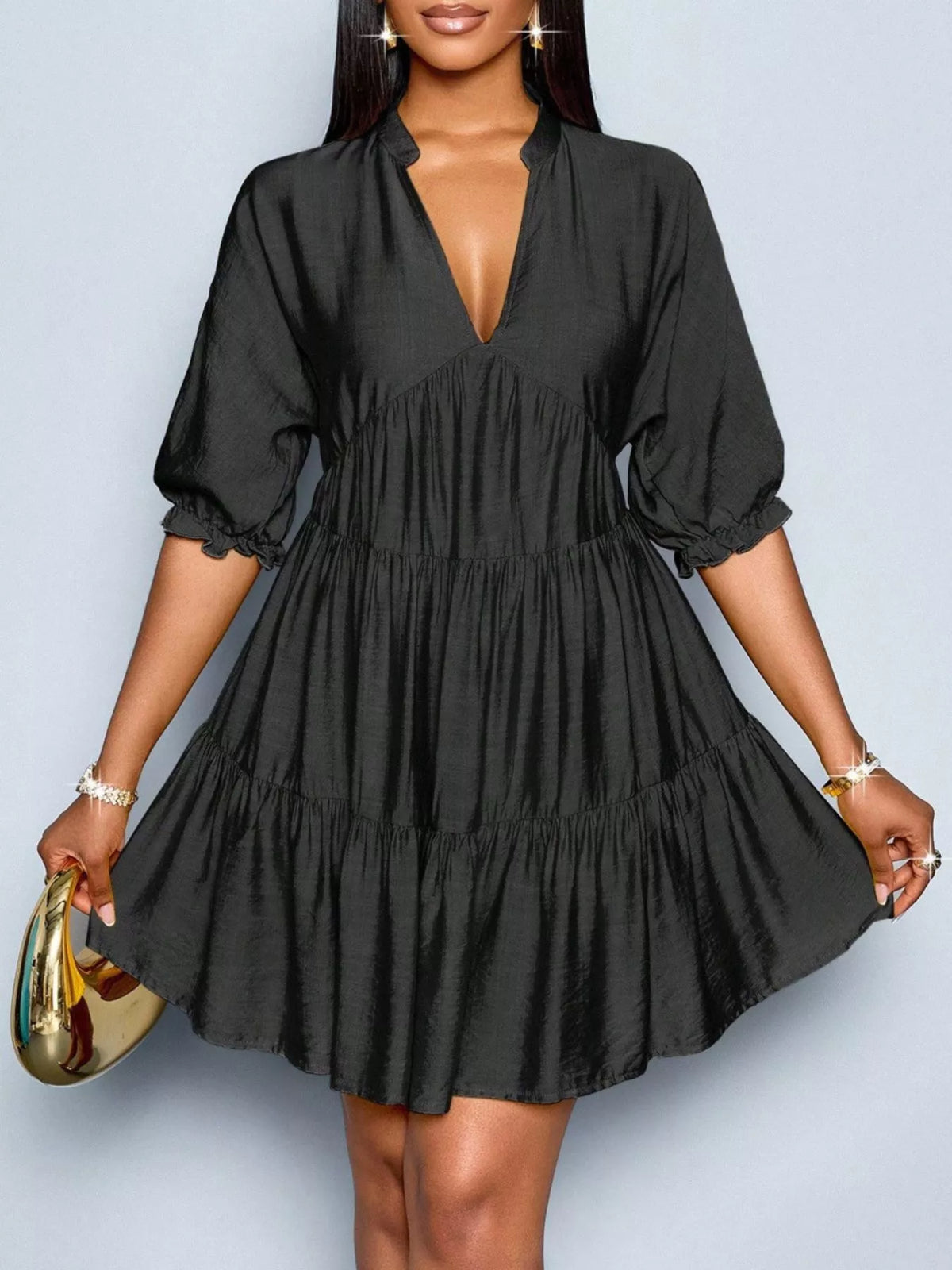 Tiered skirt hem detail on half sleeve dress