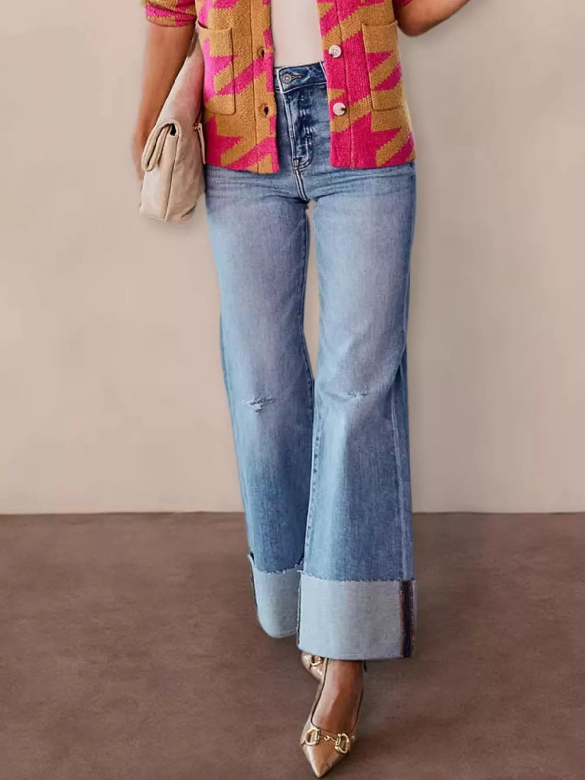 Back view of high waisted flare denim