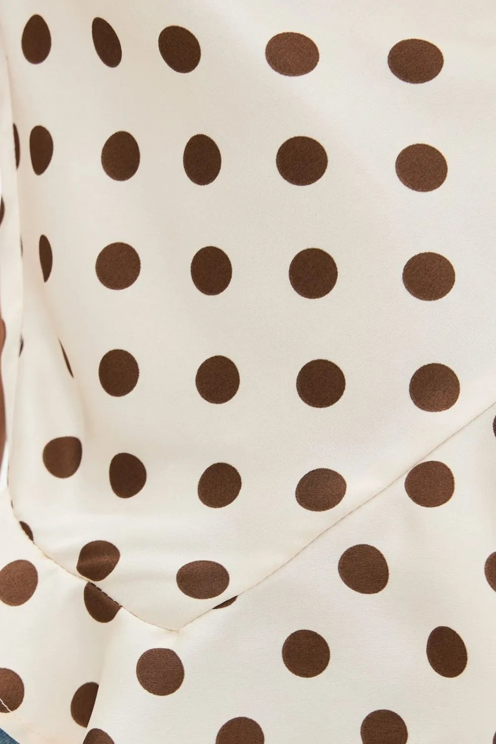 Polka dot cami top close up ruffle detail