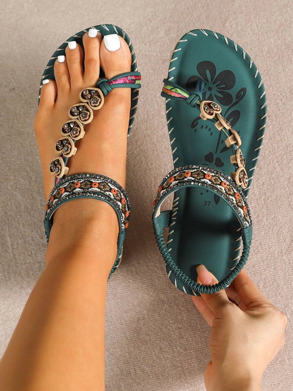 Slip on toe loop sandals strap detail
