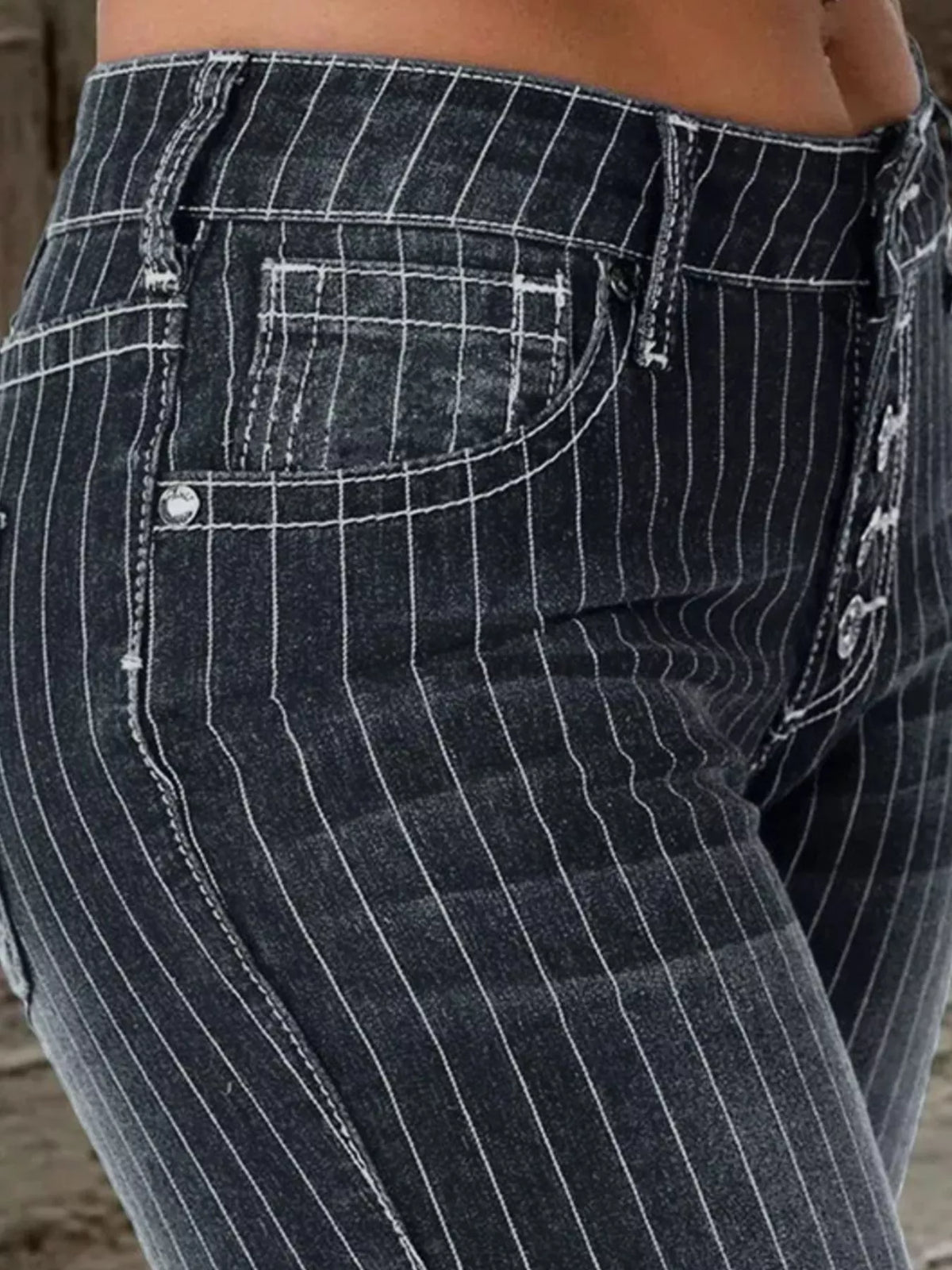 Rear styling of striped flare denim