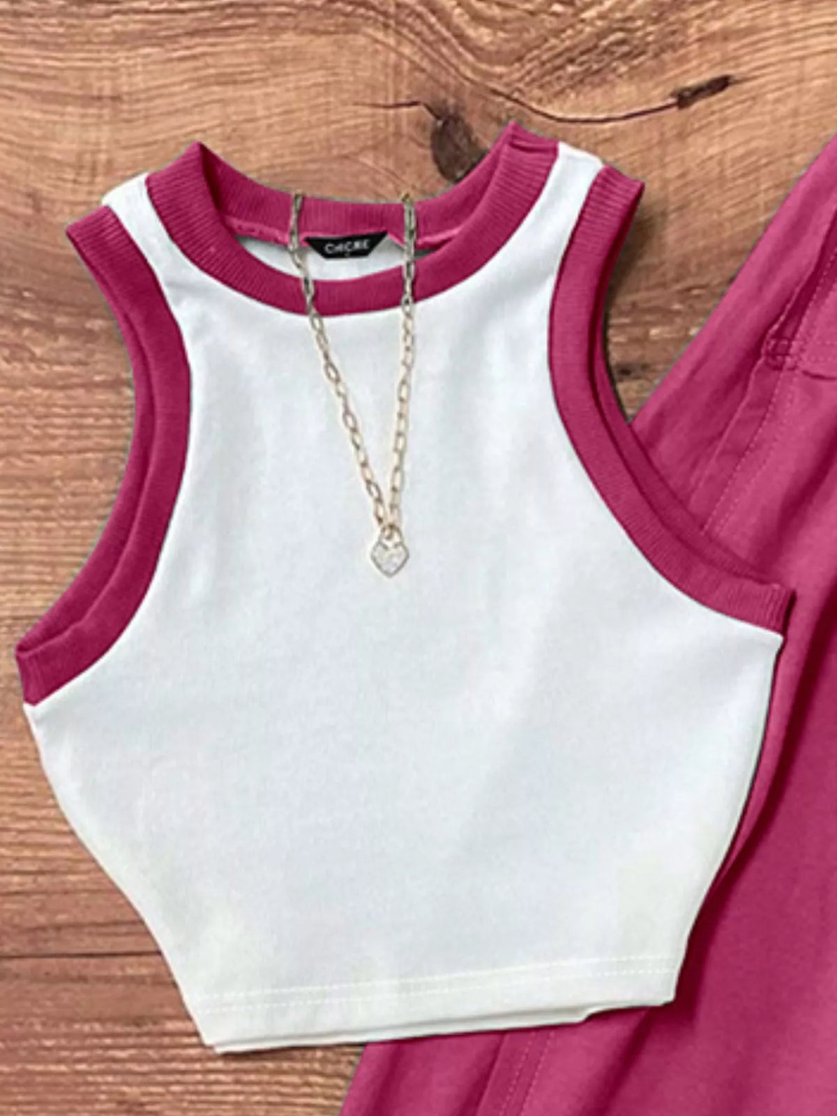 Coordinated rose red contrast trim tank and skirt set detail