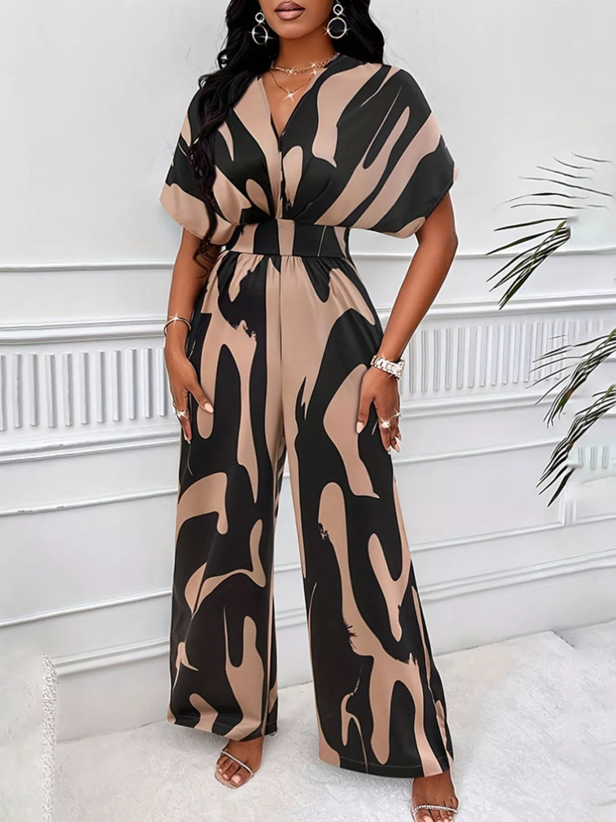 Abstract print wide leg jumpsuit with ruched bodice styled view