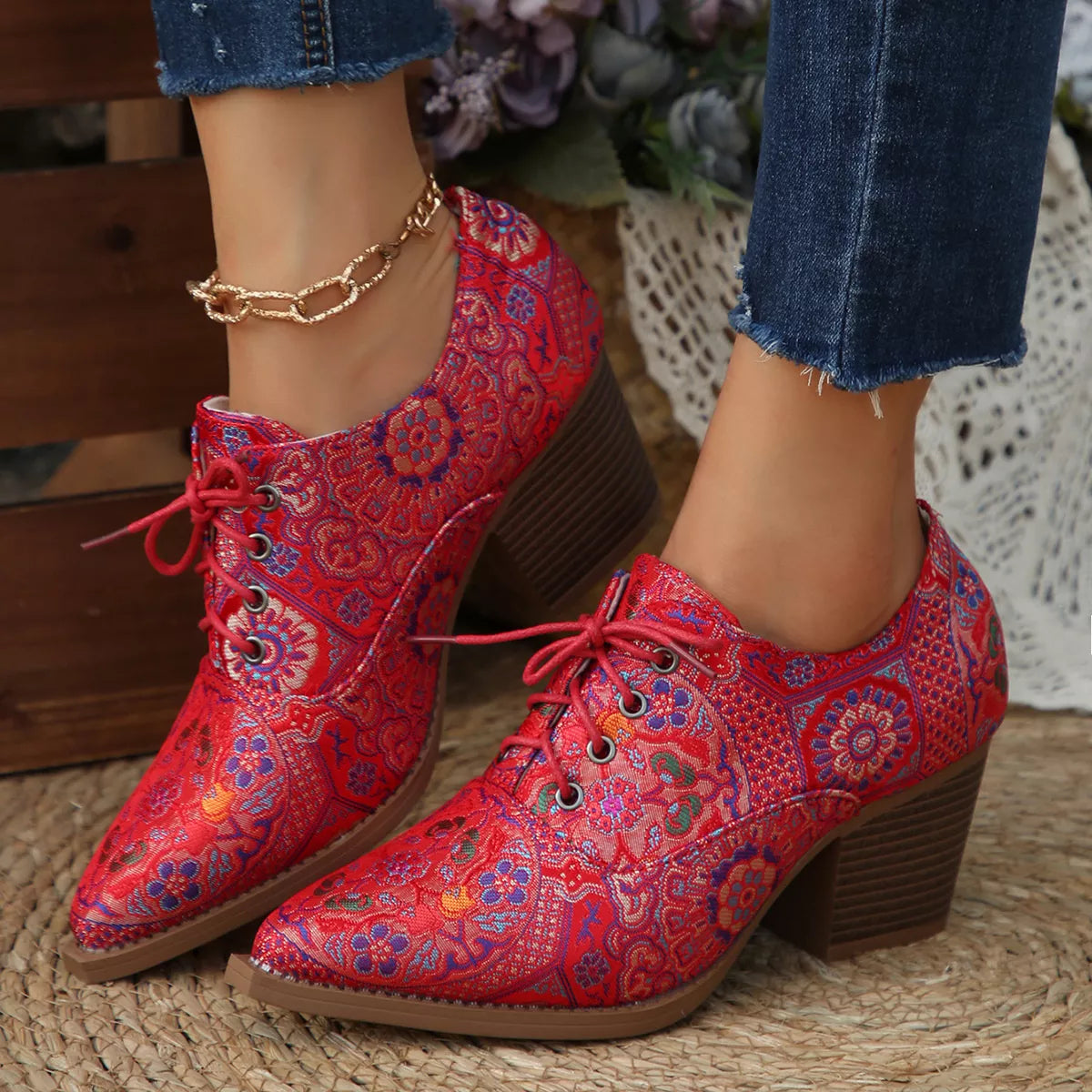 Point toe ankle boots styled with denim