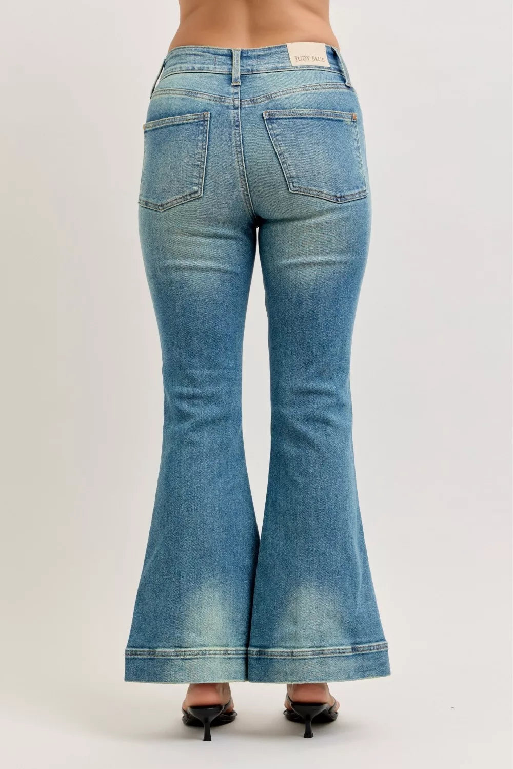 Judy Blue vintage wash flare jeans hem detail
