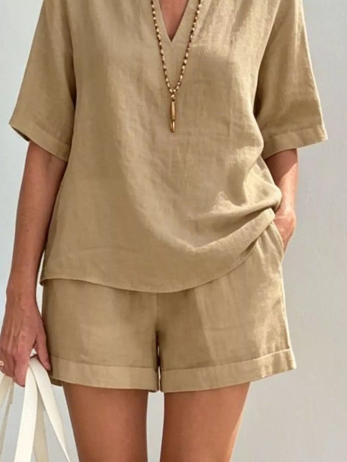 Neckline detail on the half sleeve set top