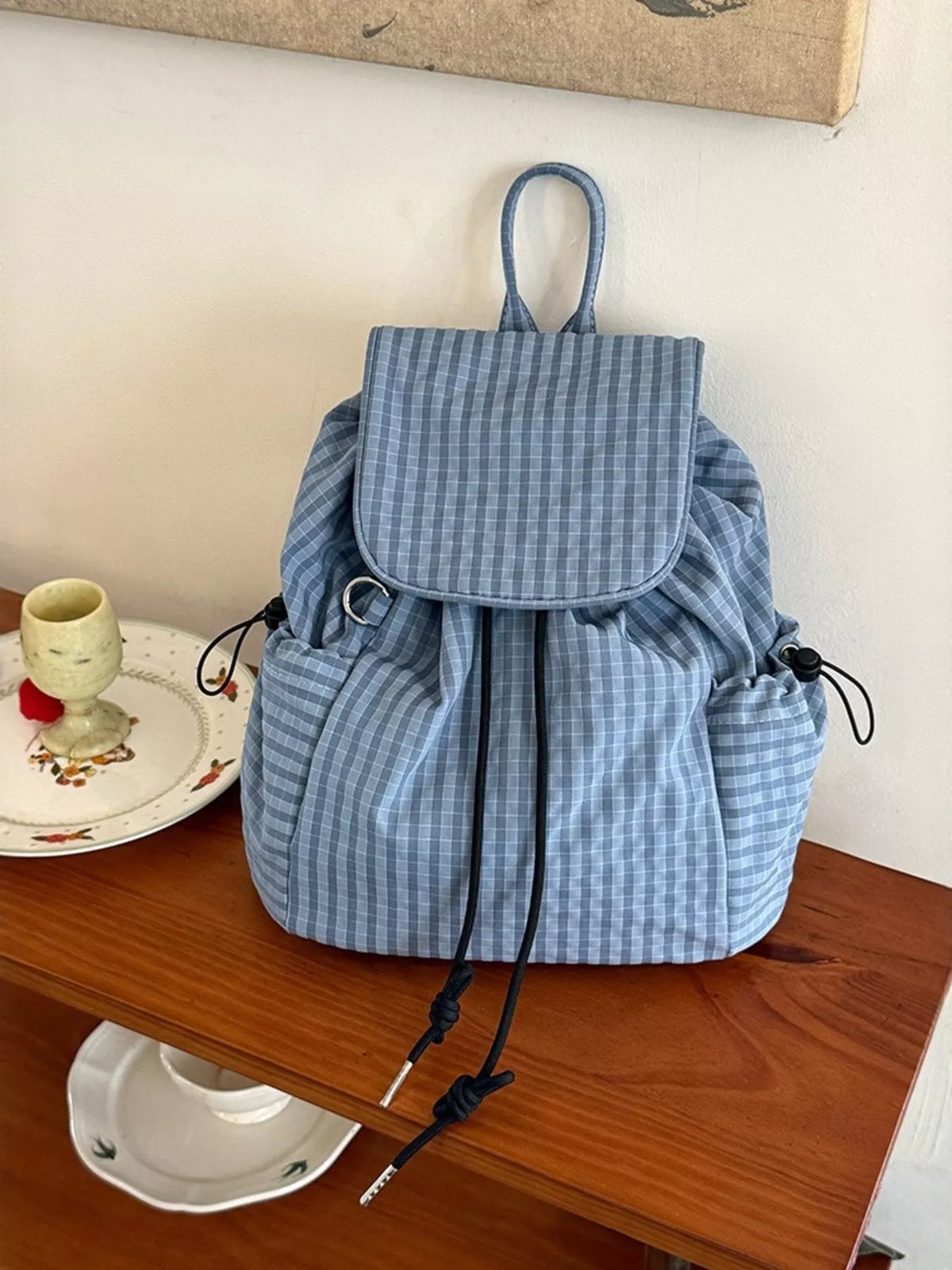 Yellow plaid drawstring canvas backpack front view