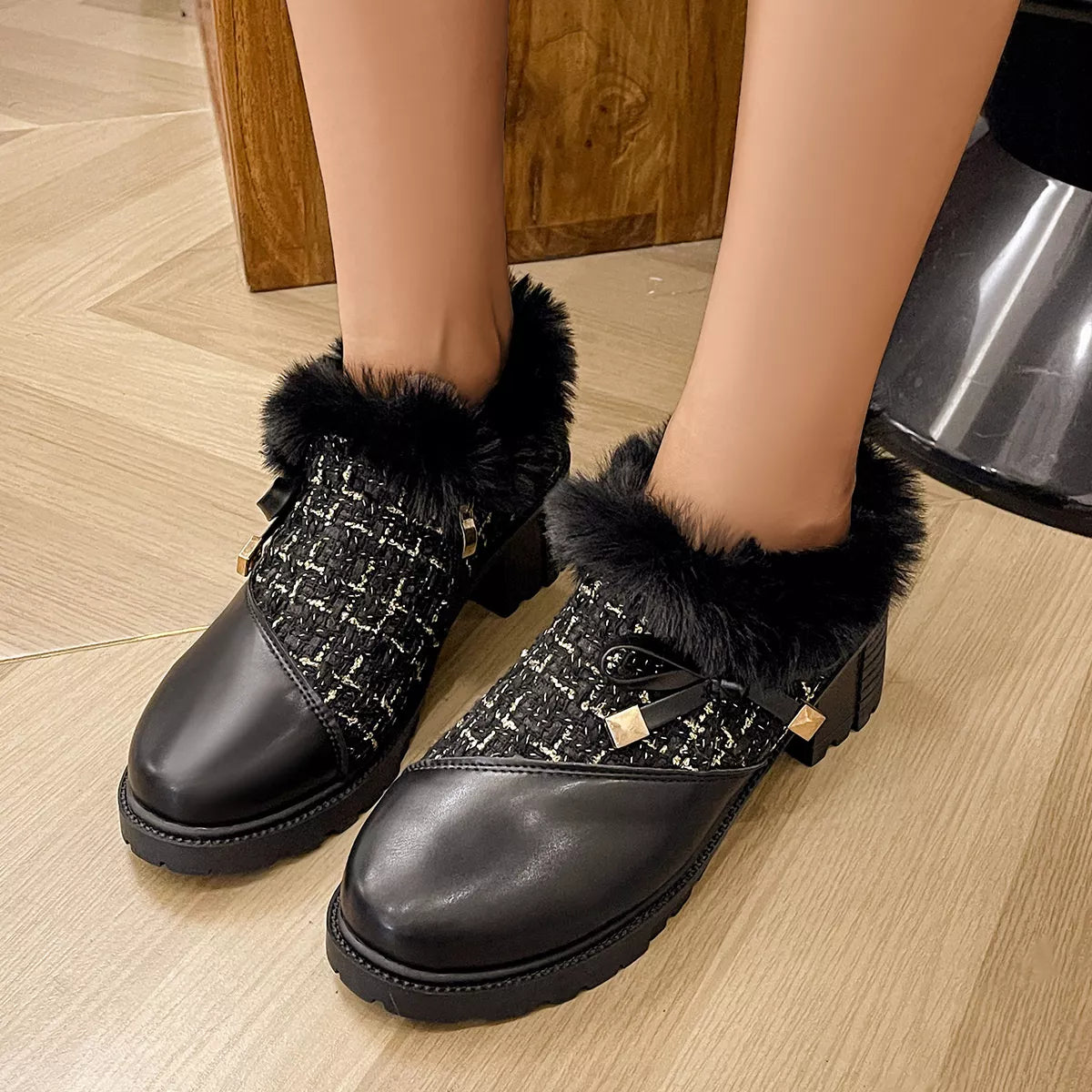 Fur trimmed round toe block heel boots heel and sole detail
