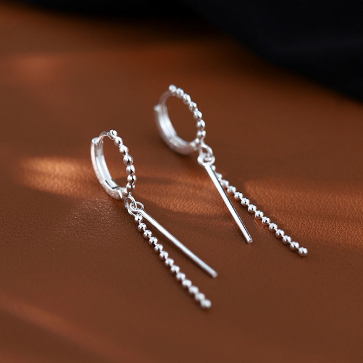 Hoop drop earrings pair closeup
